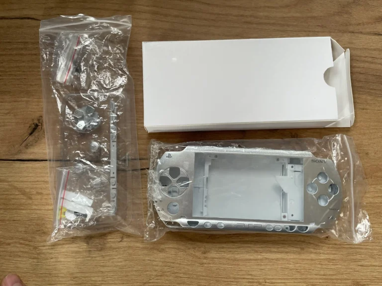 Sony PSP 1000 originalus korpusas pilnas komplektas sidabrinis (naujas)